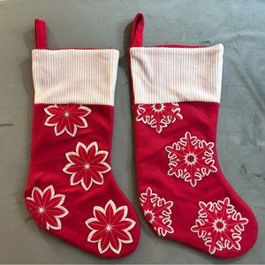 A pair of Christmas hanging stockings (snowflake, poinsettia)